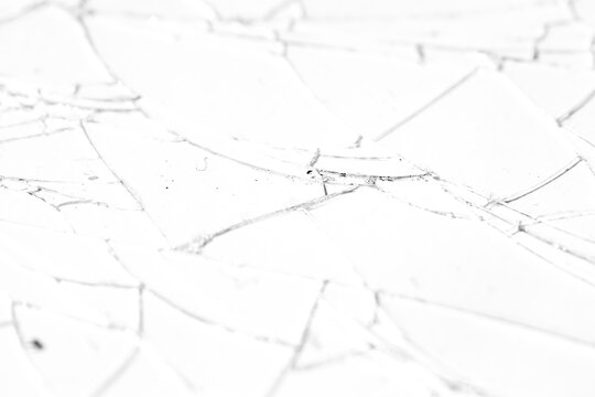 Realistic cracked glass texture overlay isolated on transparent background. High-quality PNG for photo editing and graphic design.