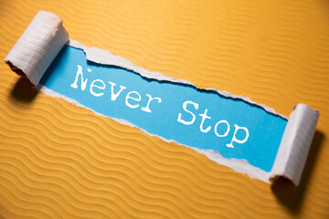 Fototapeta premium Minimalist Motivational Poster with Never Stop
