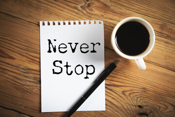 Fototapeta premium Minimalist Motivational Poster with Never Stop