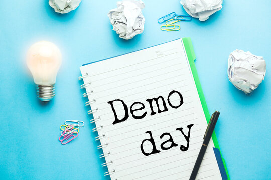 Demo day phrase written on white paper