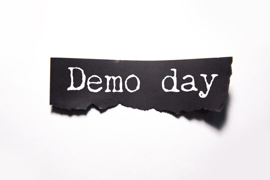Demo day phrase written on white paper