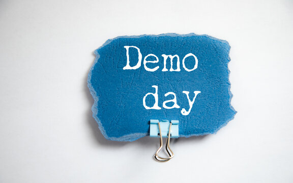 Demo day phrase written on white paper