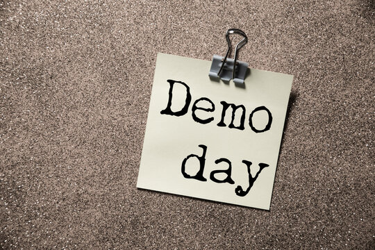 Demo day phrase written on white paper
