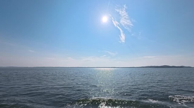 Scenic marine environment background footage with bright sky for ocean conservation project
