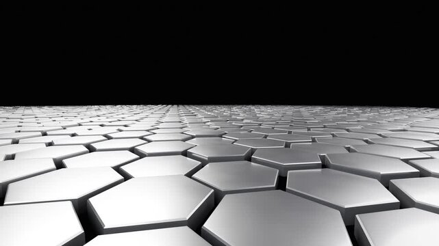 A smooth perspective of metallic hexagonal columns rising and falling in a rhythmic wave pattern.