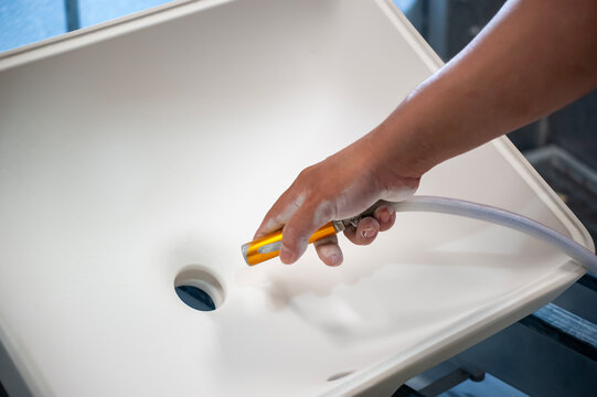 Use a flush gun to flush the water tank.