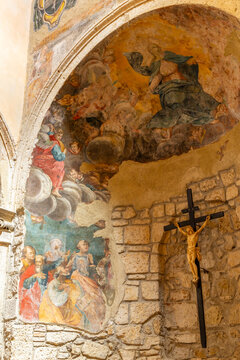 Tuscan Pitigliano church ancient religious fresco crucifix interior