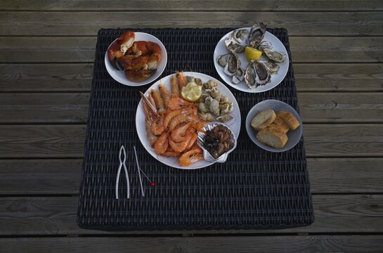 Assiette de Fruits de Mer, Breton seafood platter with oysters, langoustines, shrimps, crabs, prawns, whelks, periwinkles, bigorneaux, bulots. Crab, C&ocirc;tes-d'Armor, Brittany, France