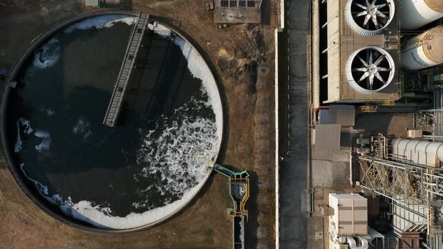 Aerial view wastewater treatment plant. Circular sedimentation tanks biological reactor, Water cleaning facility wastewater treatment plant, Recirculation solid contact clarifier sedimentation tank.