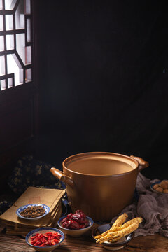 Chinese Herbal Medicine Ingredients and Clay Pot in Classical Interior