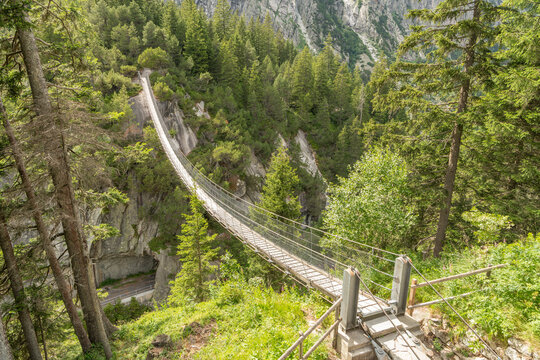 Handegg, Bern, Switzerland. Handegg suspension bridge spanning alpine gorge in the Swiss Alps near Grimsel Pass