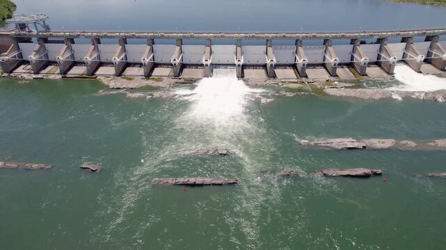 Aerial View Of The Kununurra Diversion Dam Spilling Water Across The Ord River In The Kimberley Region Of Western Australia