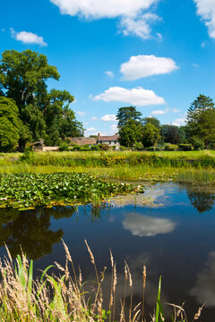 Idyllic homes around the picturesque village green and ponds at Frampton on Severn, Gloucestershire, UK.