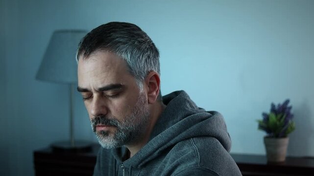 Sad and lonely man at home, breake up. Close up, standing up