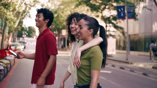 Video of group of friends having fun and talking while crossing the street.