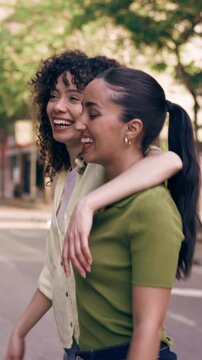 Video of group of friends having fun and talking while crossing the street.