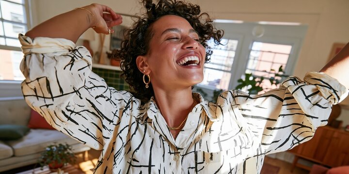 Woman in White Shirt Dancing with Joy