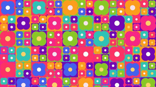 Vibrant retro floral pattern animation featuring colorful geometric flowers rotating and pulsing in a seamless loop grid.