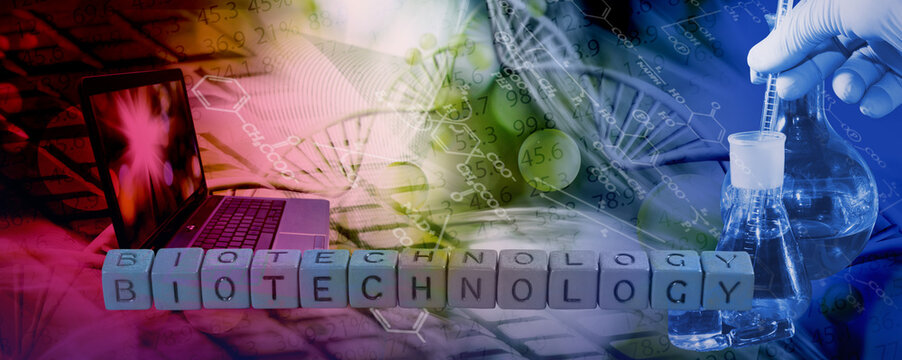 Biotechnology concepts with laboratory tools and a laptop in a workspace setting