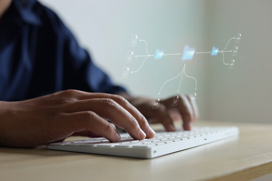 Low Angle Of Hands Typing On Computer At Office Worker For Organize Files