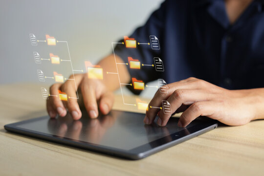 Freelancer Using Digital Tablet To Organize Data Management Inside Office