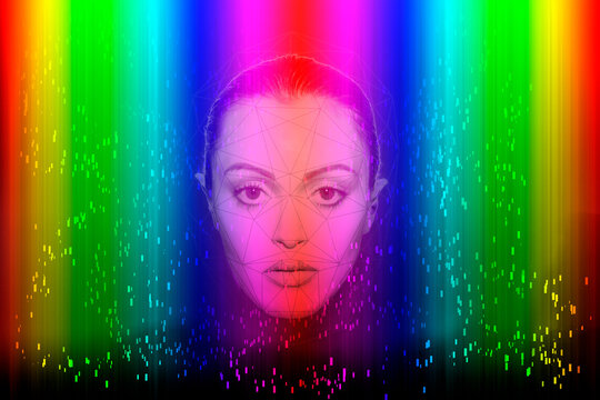 Young woman with face recognition artificial intelligence technology on multi-colored background
