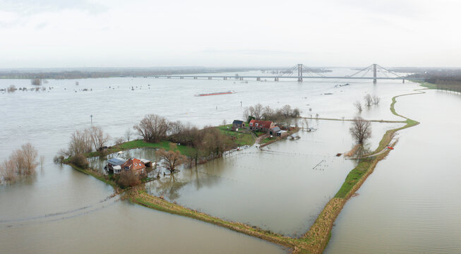 Netherlands, Aerial view of river Waal flooding surrounding land after prolonged rainfall