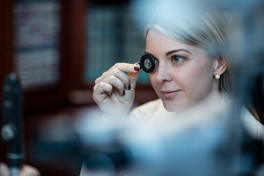 Patient at optometrist trying different lenses