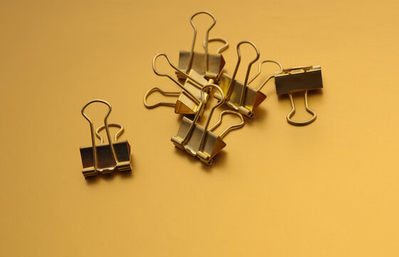 Golden binders on gold color background