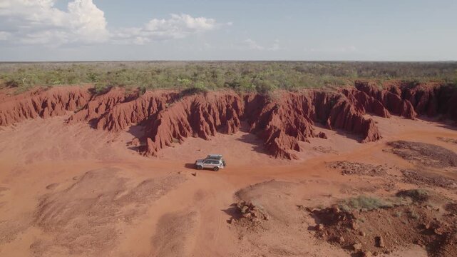 4WD Drive By Eroded Red Pindan Cliffs at James Price Point on Dampier Peninsula Kimberley Australia, Aerial Drone Shot