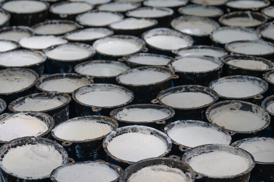 Latex obtained from tapping rubber trees.