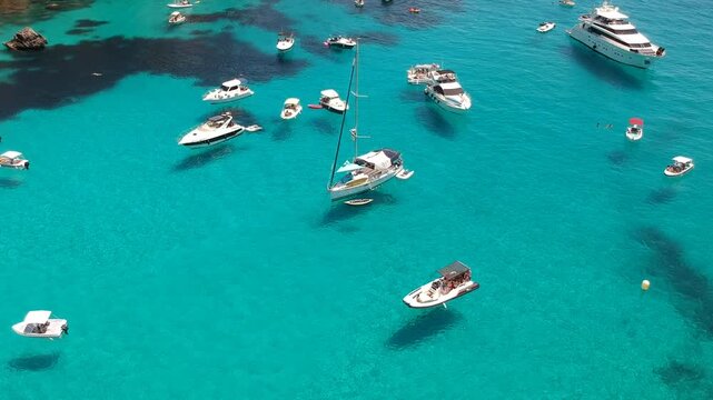 Cala Macarella Boats and Yachts in a Turquoise Bay Overhead Aerial Drone Footage Menorca Spain Balearic Islands