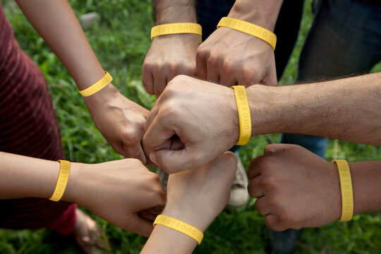 Hands with wristbands 