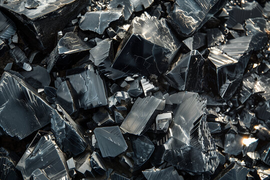 Black obsidian volcanic glass texture background