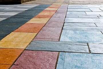 Fototapeta premium Outdoor stone paving samples arranged in gradient colors garden architectural stonework with tactile