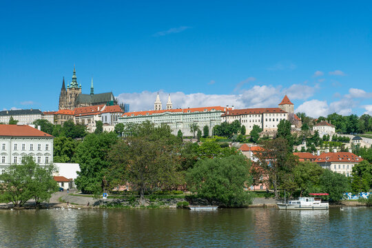Prague Castle and the buildings of the town viewed from the Vtlava River.