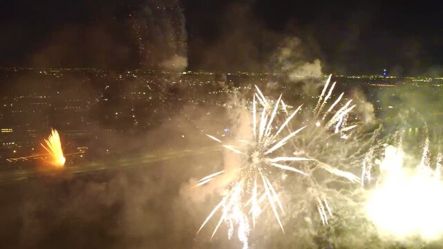 Fireworks over La Ronde and the Saint Lawrence River in Montreal, Quebec, Canada at night. g.