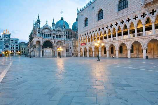 St. Mark's Square (Piazza San Marco) at Dawn, a romantic empty square with the basilica of San Marco, a renaissance building with domes and arches, a UNESCO world heritage site and the Doge's palace