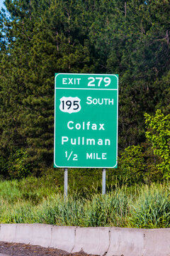 Colfax-Pullman exit sign on Highway 195, a green sign with white lettering.