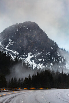 Driving over Snoqualmie Pass through the Cascade Mountains on Interstate 90 in winter