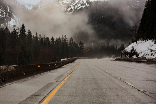 Driving over Snoqualmie Pass through the Cascade Mountains on Interstate 90 in winter