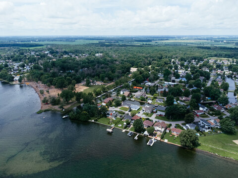 Aerial view of Zontic Beach waterfront neighborhood in Saint Zotique, Quebec, Canada on a summer day. g.