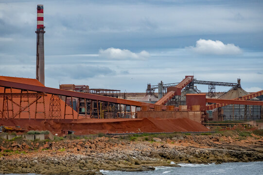 Heavy Industrial Alumina Refinery and Primary Aluminum Processing Plant Illustrating Raw Material Supply Chain and Energy Commodity Production