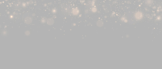 Brilliant gold dust glows with tiny sparkling particles. Warm bokeh lights drift across the background, creating a magical luxury holiday effect. PNG. © Freesstock