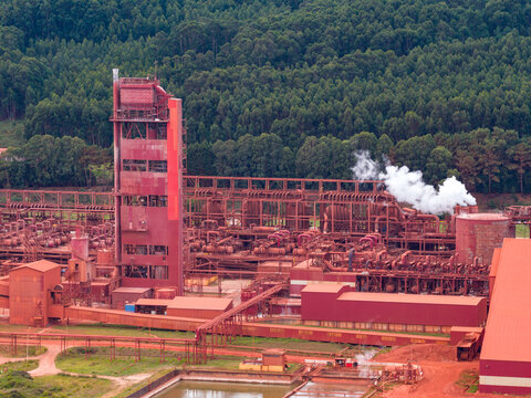 Aerial View of Heavy Industrial Alumina Refinery and Primary Aluminum Processing Plant Illustrating Raw Material Supply Chain and Energy Commodity Production