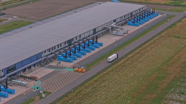 High angle view of a large, modern google data center facility showing its massive infrastructure for cloud computing and data storage