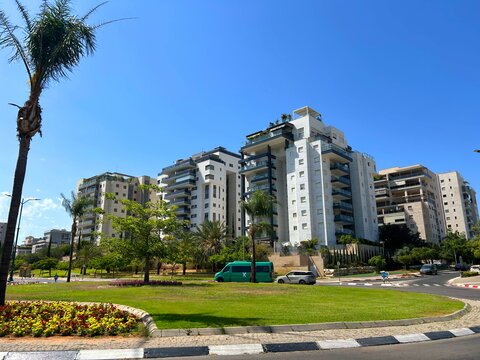 Israel Holon July 2, 2026. Modern residential quarter, nice cozy streets and new buildings. Israeli real estate, rent, purchase