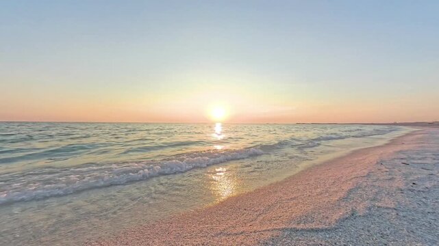 Golden hour light over the sea at Mari Ermi beach, Sinis Peninsula, Sardinia, Italy
