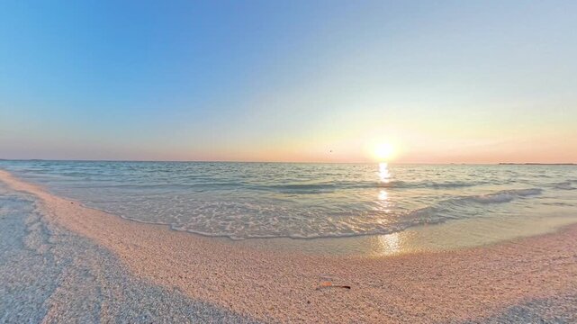 Warm evening light over the sea at Mari Ermi beach, Sinis Peninsula, Sardinia, Italy