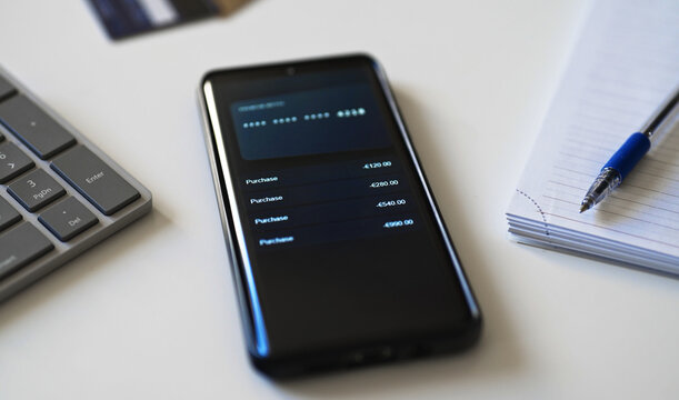 Online purchase history on modern smartphone screen.